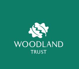 image of woodland trust logo of two white oak leaves on green background.